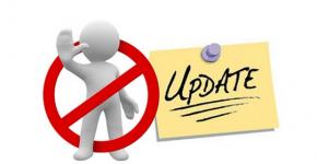 How to disable automatic system updates in Windows XP?